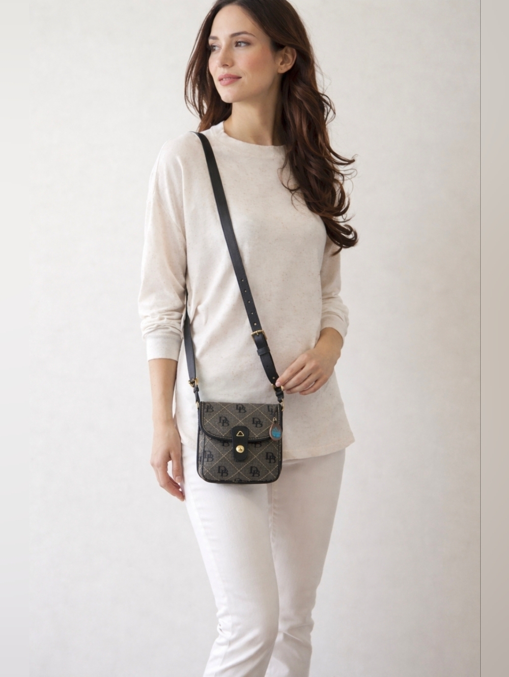 Like new!Dooney and bourke Signature Jacquard black /Gray Crossbody bag